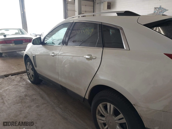 2014 Cadillac SRX Luxury Collection with VIN 3GYFNEE35ES681424, listed as a IAAI auction lot 41854969 with 135,163 mi miles. Bid and sale history available at carsss.com. Image 6.