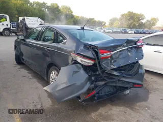 2017 Ford Fusion S with VIN 3FA6P0G76HR121500, listed as a IAAI auction lot 40308024 with 130,325 mi miles. Bid and sale history available at carsss.com. Image 3.