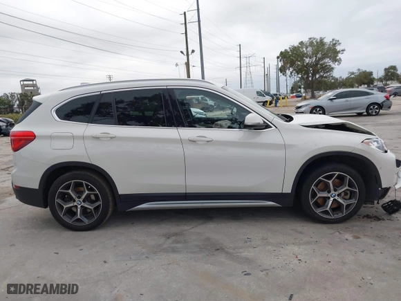 2018 BMW X1 xDrive28i with VIN WBXHT3C37J3H33461, listed as a IAAI auction lot 40997589 with 1 mi miles. Bid and sale history available at carsss.com. Image 14.