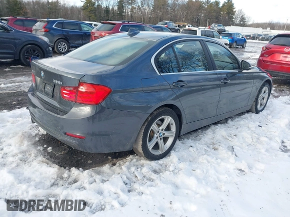 2015 BMW 3 Series 328i xDrive with VIN WBA3B5G55FNS14903, listed as a IAAI auction lot 41497975 with 62,009 mi miles. Bid and sale history available at carsss.com. Image 4.