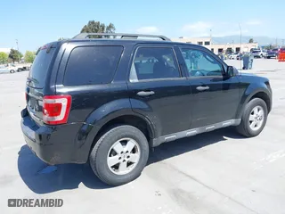 2012 Ford Escape XLT with VIN 1FMCU0D71CKC10734, listed as a IAAI auction lot 42065049 with 207,698 mi miles. Bid and sale history available at carsss.com. Image 4.