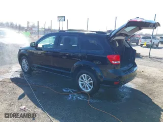 2016 Dodge Journey SXT with VIN 3C4PDDBGXGT216066, listed as a IAAI auction lot 41679025 with 123,265 mi miles. Bid and sale history available at carsss.com. Image 3.