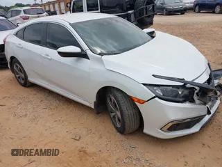 2020 Honda Civic LX with VIN 19XFC2F62LE003793, listed as a IAAI auction lot 42432808 with 30,280 mi miles and . Bid and sale history available at DreamBid. Image 1.