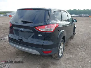 2014 Ford Escape SE z VIN 1FMCU9G9XEUA15367, wystawiony jako IAAI lot #42358528 z przebiegiem 145 994 mil mil oraz . Historia ofert i sprzedaży dostępna na DreamBid. Obrazek 4.