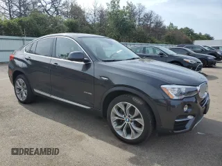 2018 BMW X4 xDrive28i with VIN 5UXXW3C56J0Z60753, listed as a Copart auction lot 60642114 with 34,074 mi miles and Salvage Title. Bid and sale history available at carsss.com. Image 4.