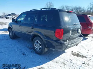 2004 Honda Pilot EX with VIN 2HKYF18544H574133, listed as a IAAI auction lot 41415703 with 217,539 mi miles. Bid and sale history available at carsss.com. Image 3.