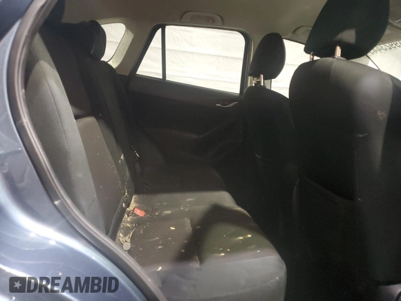 2016 Mazda CX-5 Sport z VIN JM3KE4BY0G0768549, wystawiony jako Copart lot #49923445 z przebiegiem 130 236 mil mil oraz Szkoda całkowita • Salvage title. Historia ofert i sprzedaży dostępna na DreamBid. Obrazek 12.