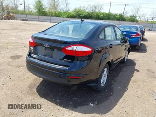2019 Ford Fiesta SE with VIN 3FADP4BJ2KM165435, listed as a IAAI auction lot 42077508 with 118,784 mi miles. Bid and sale history available at carsss.com. Image 4.