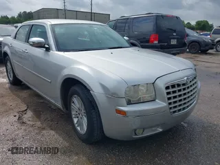 2010 Chrysler 300 Touring with VIN 2C3CA5CV1AH272993, listed as a IAAI auction lot 42154073 with 224,685 mi miles and . Bid and sale history available at DreamBid. Image 1.