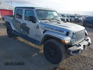 2023 Jeep Gladiator Overland with VIN 1C6HJTFG0PL569940, listed as a IAAI auction lot 41772170 with 28,948 mi miles and . Bid and sale history available at DreamBid. Image 1.