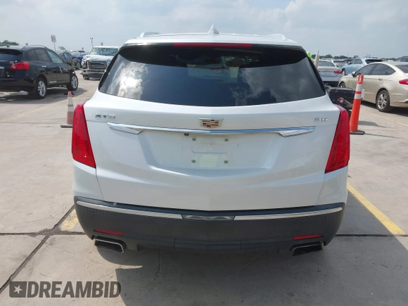 2017 Cadillac XT5 FWD with VIN 1GYKNARS3HZ225471, listed as a IAAI auction lot 42168166 with 149,685 mi miles and . Bid and sale history available at DreamBid. Image 16.