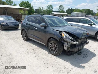 2019 Hyundai Tucson Sport z VIN KM8J33AL2KU909919, wystawiony jako IAAI lot #42055525 z przebiegiem 109 985 mil mil oraz . Historia ofert i sprzedaży dostępna na DreamBid. Obrazek 1.