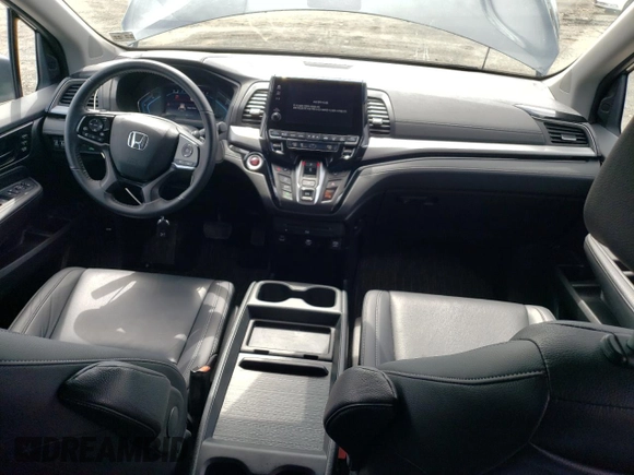 2023 Honda Odyssey Touring with VIN 5FNRL6H84PB019285, listed as a Copart auction lot 53273085 with 29,053 mi miles and Salvage Title. Bid and sale history available at DreamBid. Image 8.