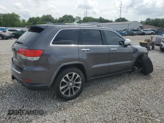 2017 Jeep Grand Cherokee Overland z VIN 1C4RJFCG1HC684826, wystawiony jako Copart lot #59971595 z przebiegiem 101 765 mil mil oraz Szkoda całkowita • Salvage title. Historia ofert i sprzedaży dostępna na DreamBid. Obrazek 3.