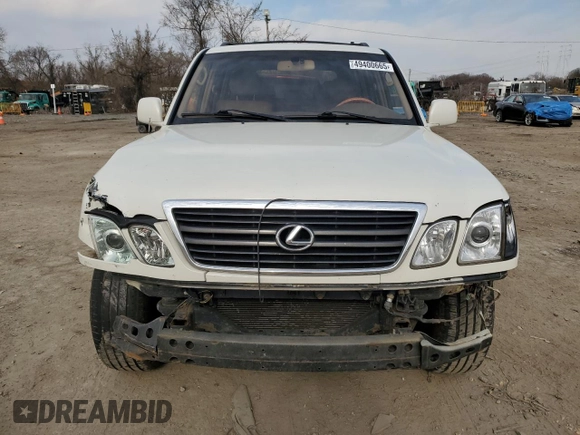 2000 Lexus LX 470 z VIN JT6HT00W8Y0126253, wystawiony jako Copart lot #49400665 z przebiegiem 181 328 mil mil oraz Szkody całkowita. Historia ofert i sprzedaży dostępna na DreamBid. Obrazek 5.