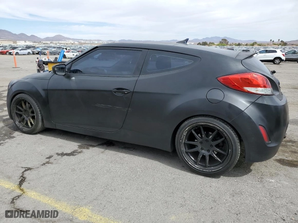 2016 Hyundai Veloster with VIN KMHTC6AD9GU265913, listed as a Copart auction lot 50021385 with 117,156 mi miles and Salvage Title. Bid and sale history available at carsss.com. Image 2.