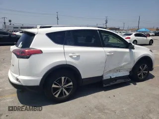 2018 Toyota RAV4 XLE with VIN JTMWFREVXJD118021, listed as a Copart auction lot 58845805 with 108,068 mi miles and Salvage title. Bid and sale history available at DreamBid. Image 3.