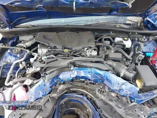 2025 Toyota Camry LE with VIN 4T1DAACK0SU091506, listed as a IAAI auction lot 41880460 with 8,407 mi miles and . Bid and sale history available at DreamBid. Image 10.