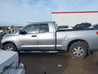 2012 Toyota Tundra с VIN 5TFRM5F14CX037380, выставлен на аукционе IAAI как лот 41683381 с пробегом 218 413 миль миль и . История ставок и продаж доступна на DreamBid. Изображение 15.