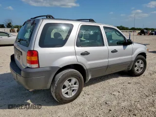 2007 Ford Escape XLS with VIN 1FMYU02Z87KB60530, listed as a Copart auction lot 61273345 with 57,574 mi miles and Salvage title. Bid and sale history available at DreamBid. Image 3.