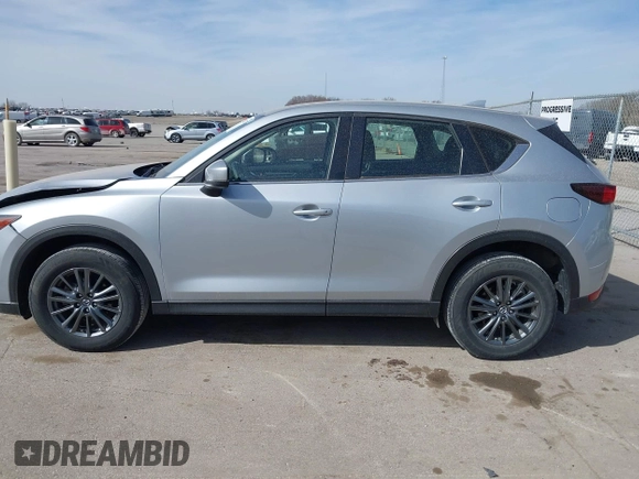 2019 Mazda CX-5 Sport with VIN JM3KFBBM6K1582760, listed as a IAAI auction lot 41822152 with 60,620 mi miles and . Bid and sale history available at DreamBid. Image 14.