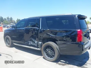 2017 Chevrolet Suburban LT z VIN 1GNSKHKC9HR234340, wystawiony jako IAAI lot #42327787 z przebiegiem 79 013 mil mil oraz . Historia ofert i sprzedaży dostępna na DreamBid. Obrazek 6.