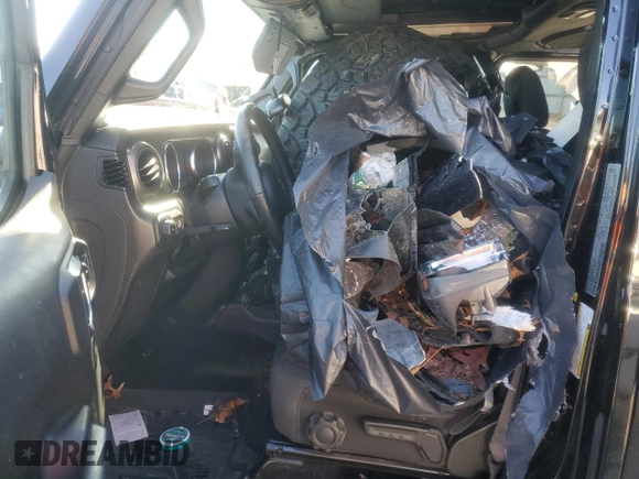 2022 Jeep Wrangler Unlimited Sport with VIN 1C4HJXDG6NW144897, listed as a Copart auction lot 83474284 with Not Provided miles and Salvage Title. Bid and sale history available at DreamBid. Image 7.