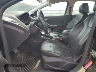2013 Ford Focus SE z VIN 1FADP3F28DL292238, wystawiony jako Copart lot #51016715 z przebiegiem 165 699 mil mil oraz Szkoda całkowita • Salvage title. Historia ofert i sprzedaży dostępna na DreamBid. Obrazek 7.