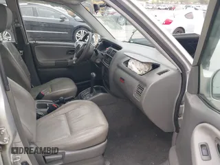 2001 Chevrolet Tracker LT z VIN 2CNBJ634916959876, wystawiony jako IAAI lot #42166992 z przebiegiem 97 878 mil mil oraz . Historia ofert i sprzedaży dostępna na DreamBid. Obrazek 5.