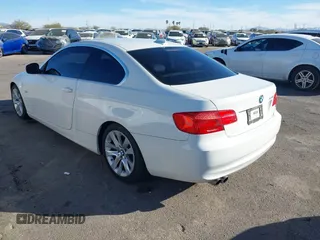 2012 BMW 3 Series 328i with VIN WBAKE5C53CJ106162, listed as a IAAI auction lot 41330065 with 160,624 mi miles and . Bid and sale history available at carsss.com. Image 3.