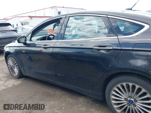 2015 Ford Fusion Titanium with VIN 3FA6P0D99FR300200, listed as a IAAI auction lot 42037306 with 232,095 mi miles. Bid and sale history available at carsss.com. Image 14.