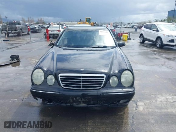 2000 Mercedes-Benz E-Class with VIN WDBJF65JXYA997410, listed as a IAAI auction lot 41939485 with 158,559 mi miles. Bid and sale history available at carsss.com. Image 13.
