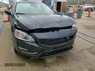 2016 Volvo S60 T5 Drive-E Premier z VIN YV126MFK5G2412365, wystawiony jako Copart lot #51577155 z przebiegiem 59 319 mil mil oraz Szkoda całkowita • Salvage title. Historia ofert i sprzedaży dostępna na DreamBid. Obrazek 13.