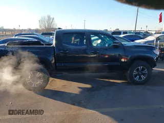 2016 Toyota Tacoma SR with VIN 3TMCZ5AN0GM023263, listed as a IAAI auction lot 41302069 with 137,276 mi miles and . Bid and sale history available at DreamBid. Image 14.