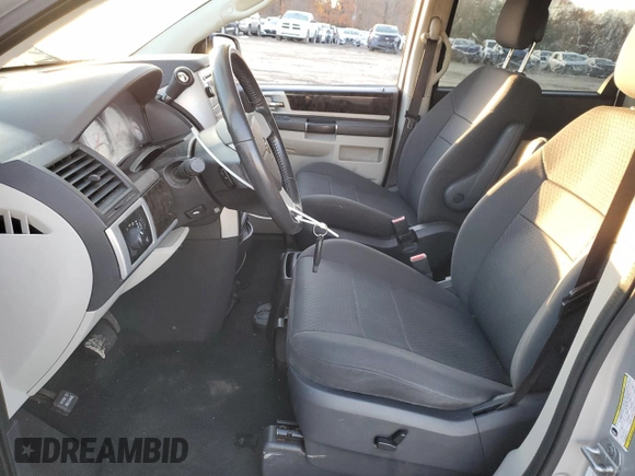 2010 Dodge Grand Caravan SXT with VIN 2D4RN5D16AR496795, listed as a Copart auction lot 83374834 with 99,902 mi miles and Salvage Title. Bid and sale history available at DreamBid. Image 7.