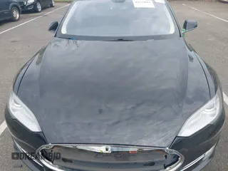 2014 Tesla Model S 60 with VIN 5YJSA1H13EFP33693, listed as a IAAI auction lot 42132094 with Not Provided miles and . Bid and sale history available at DreamBid. Image 10.