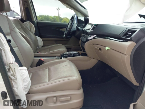 2016 Honda Pilot Elite with VIN 5FNYF6H00GB104329, listed as a IAAI auction lot 41905390 with 125,501 mi miles. Bid and sale history available at carsss.com. Image 5.