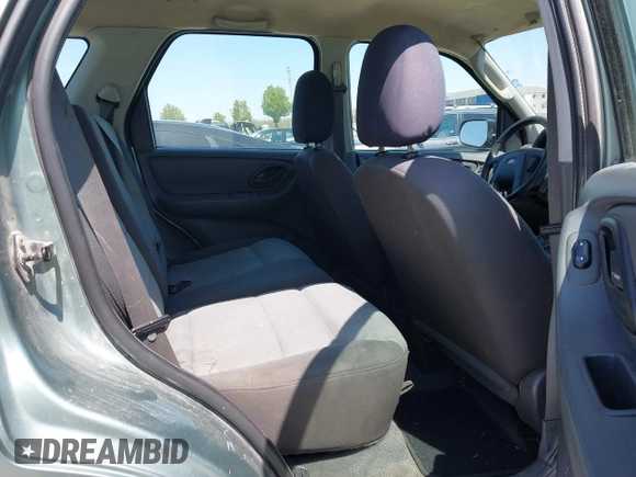 2005 Ford Escape XLS Value z VIN 1FMYU92Z75DA03268, wystawiony jako IAAI lot #42051311 z przebiegiem 124 985 mil mil oraz . Historia ofert i sprzedaży dostępna na DreamBid. Obrazek 8.