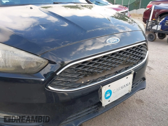2015 Ford Focus SE with VIN 1FADP3K2XFL319559, listed as a IAAI auction lot 42205107 with 184,499 mi miles. Bid and sale history available at carsss.com. Image 14.