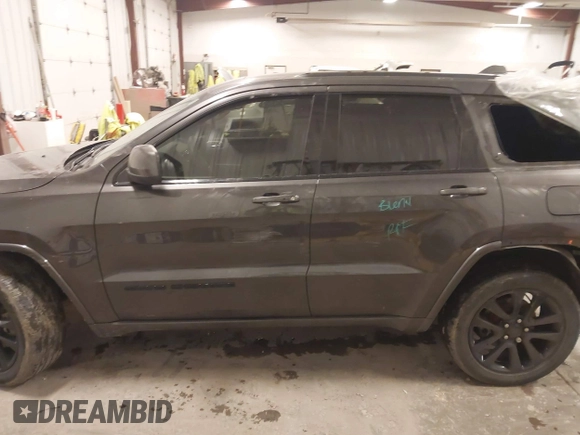 2018 Jeep Grand Cherokee Laredo E with VIN 1C4RJFAG6JC499261, listed as a IAAI auction lot 41033418 with 67,554 mi miles and . Bid and sale history available at DreamBid. Image 14.