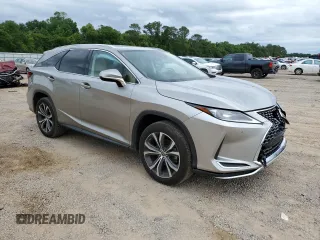 2020 Lexus RX 350L with VIN JTJHZKEA1L2017725, listed as a Copart auction lot 56022175 with 100,463 mi miles and Salvage title. Bid and sale history available at DreamBid. Image 4.