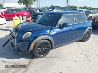 2016 MINI Cooper Hardtop 4 Door S with VIN WMWXU3C54G2D30766, listed as a IAAI auction lot 42008026 with 101,898 mi miles. Bid and sale history available at carsss.com. Image 17.
