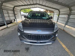 2020 Ford Escape Titanium Hybrid with VIN 1FMCU0DZ2LUB82013, listed as a IAAI auction lot 42621621 with 92,623 mi miles and . Bid and sale history available at DreamBid. Image 1.