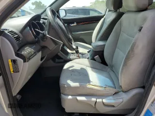 2013 Kia Sorento LX with VIN 5XYKT4A20DG323200, listed as a Copart auction lot 61738005 with 205,312 mi miles and Salvage title. Bid and sale history available at DreamBid. Image 7.