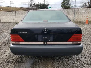 1993 Mercedes-Benz 500 z VIN WDBGA51E7PA109156, wystawiony jako Copart lot #86609194 z przebiegiem 137 885 mil mil oraz Tytuł czysty. Historia ofert i sprzedaży dostępna na DreamBid. Obrazek 6.