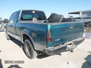 1997 Ford F-150 XL with VIN 1FTEX18L0VKC14651, listed as a IAAI auction lot 41228875 with 251,074 mi miles. Bid and sale history available at carsss.com. Image 3.