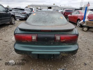 1993 Pontiac Firebird Firebird z VIN 2G2FS22S1P2201790, wystawiony jako Copart lot #79220434 z przebiegiem Nie podano mil oraz Czysty tytuł • Clean title. Historia ofert i sprzedaży dostępna na DreamBid. Obrazek 8.