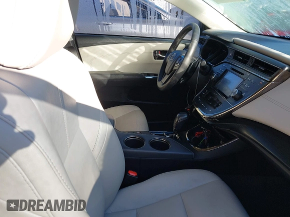 2016 Toyota Avalon Limited with VIN 4T1BK1EBXGU205973, listed as a IAAI auction lot 41206815 with 64,169 mi miles and . Bid and sale history available at DreamBid. Image 5.