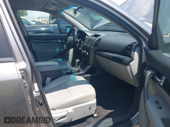 2013 Kia Sorento LX with VIN 5XYKT3A17DG405636, listed as a IAAI auction lot 42595956 with 192,632 mi miles and . Bid and sale history available at DreamBid. Image 5.
