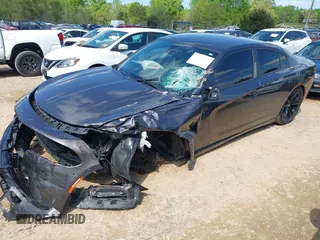 2018 Dodge Charger SXT Plus with VIN 2C3CDXHG6JH253191, listed as a IAAI auction lot 41988535 with 69,320 mi miles and . Bid and sale history available at carsss.com. Image 17.